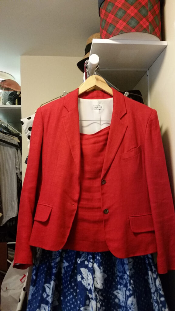 Red linen designer suit with VERY short skirt