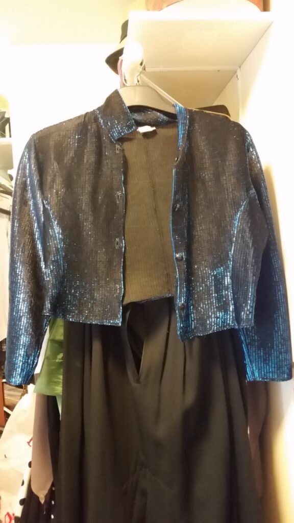Black evening jacket with electric blue thread